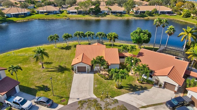 drone / aerial view with a water view