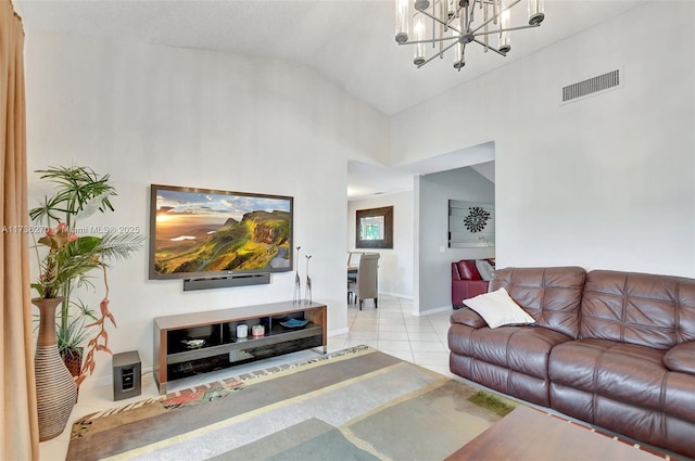 tiled living room featuring vaulted ceiling and a chandelier