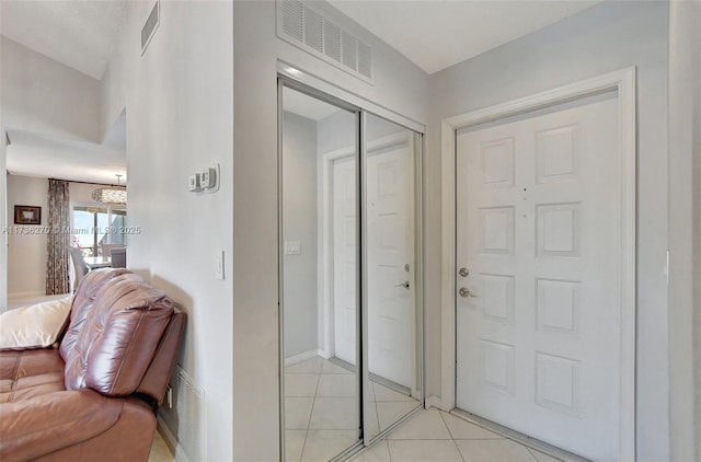 interior space featuring light tile patterned flooring