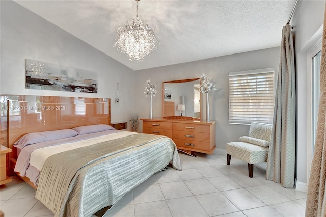 tiled bedroom featuring lofted ceiling, a notable chandelier, and a textured ceiling