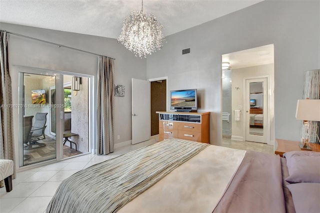 tiled bedroom with a notable chandelier, ensuite bathroom, lofted ceiling, and access to exterior