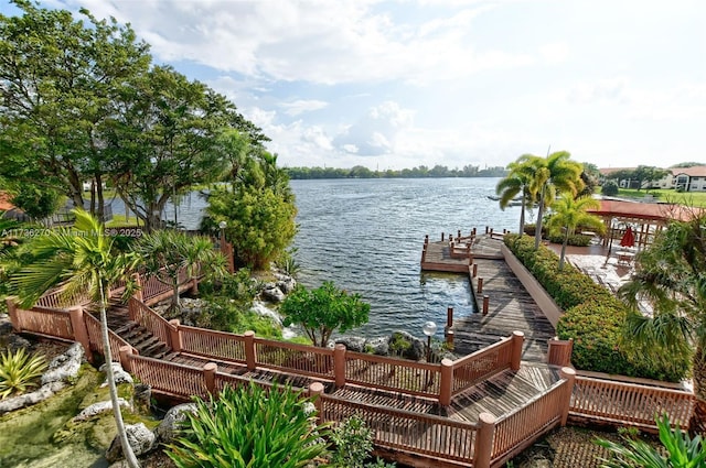 dock area with a water view