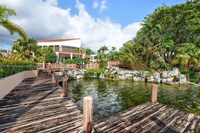 dock area with a water view