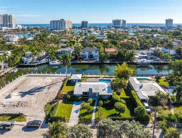 bird's eye view with a water view