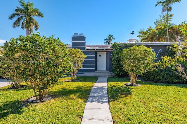 view of front of house with a front yard