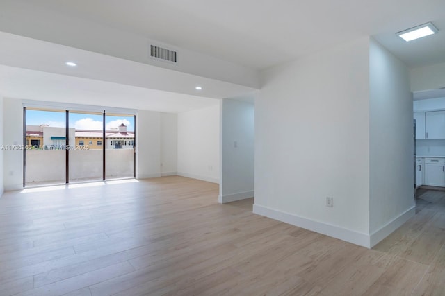 empty room featuring light hardwood / wood-style flooring