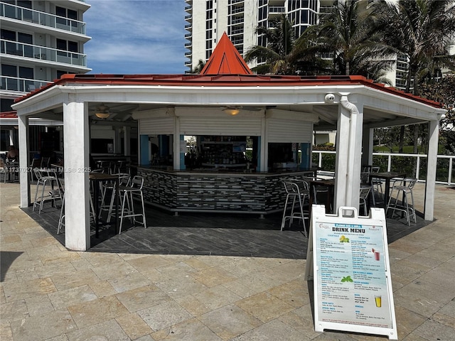 view of community featuring a bar and a gazebo