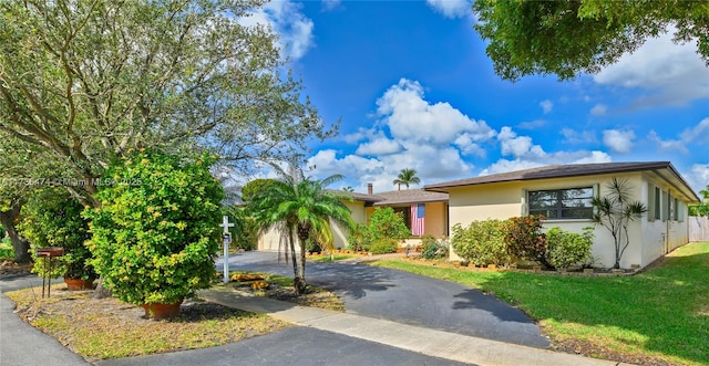 view of front of home with a front yard