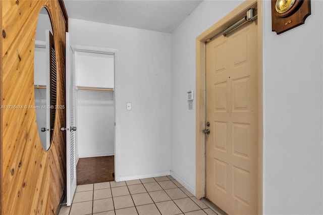 entrance foyer featuring light tile patterned flooring