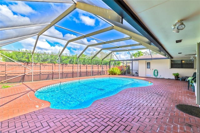 view of pool featuring a lanai and a patio area