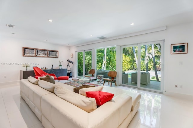 living room featuring light tile patterned flooring