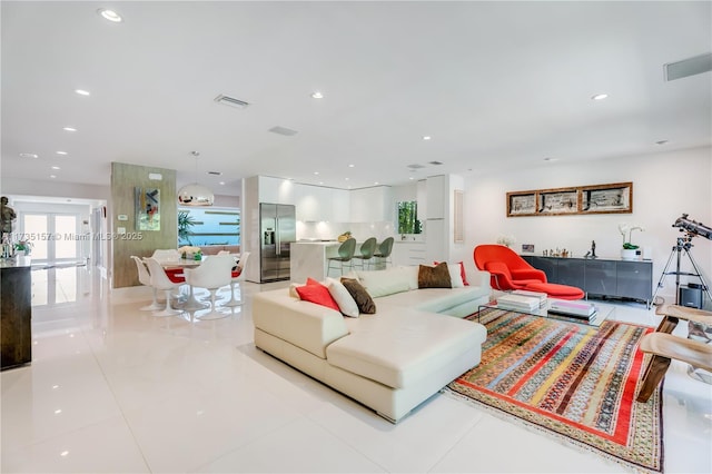 living room with light tile patterned floors