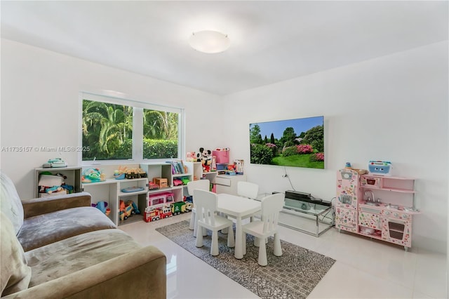 recreation room with light tile patterned floors