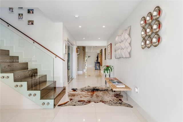 entrance foyer featuring light tile patterned floors