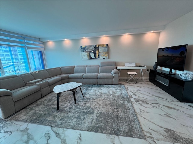 living room featuring marble finish floor