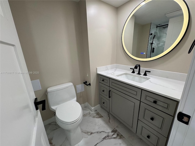 bathroom featuring toilet, vanity, baseboards, marble finish floor, and a shower