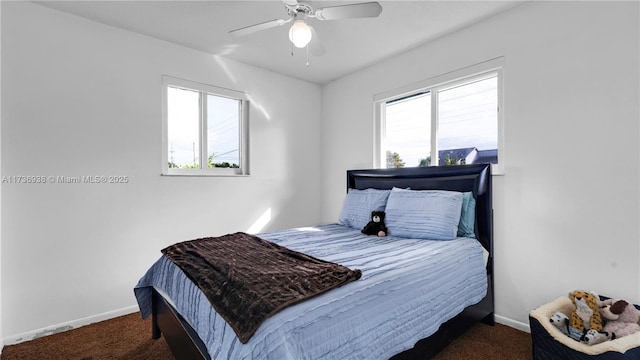 bedroom with carpet, baseboards, and ceiling fan