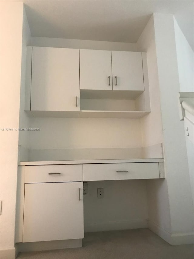 kitchen with white cabinets