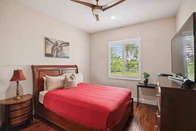 bedroom with baseboards, dark wood finished floors, a ceiling fan, and recessed lighting