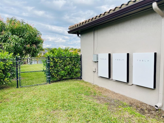 view of yard featuring a gate and fence