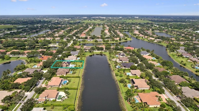 aerial view with a residential view and a water view