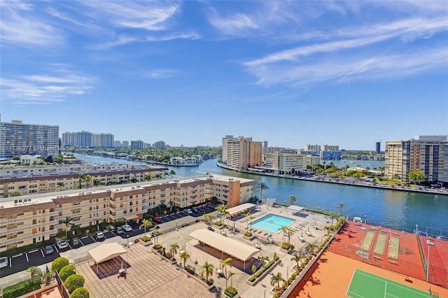 birds eye view of property with a water view