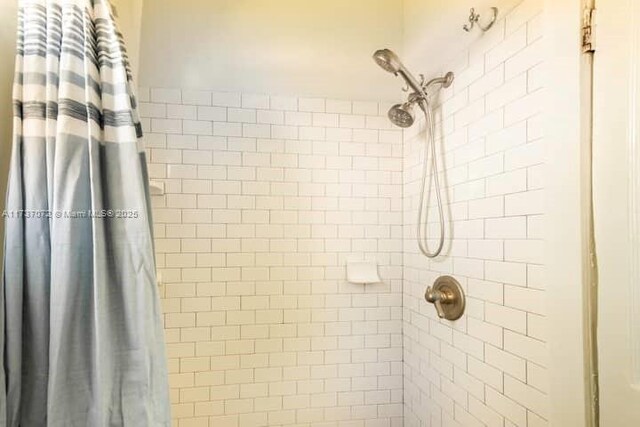 bathroom featuring walk in shower