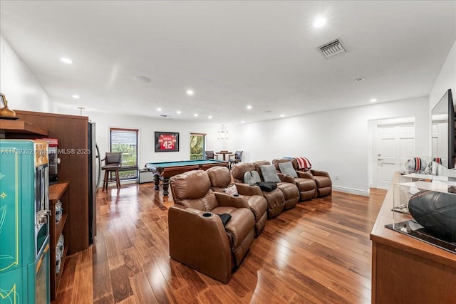 living room with pool table and hardwood / wood-style floors