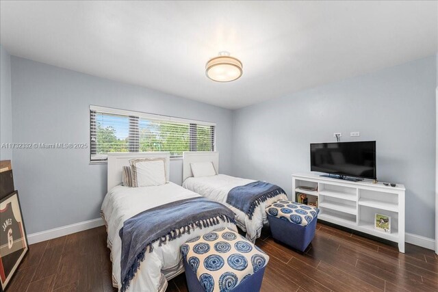 bedroom featuring dark hardwood / wood-style floors