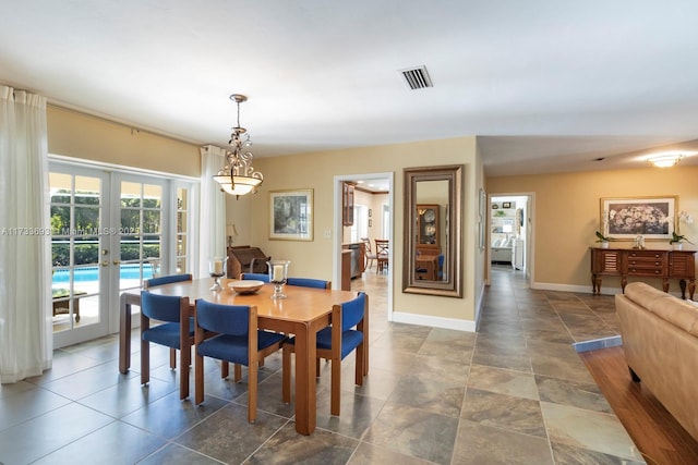 7420 SW 145th Ter, Palmetto Bay, FL 33158 - dining space with french doors