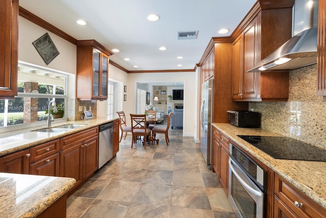 7420 SW 145th Ter, Palmetto Bay, FL 33158 - kitchen with appliances with stainless steel finishes, sink, crown molding, light stone countertops, and wall chimney range hood