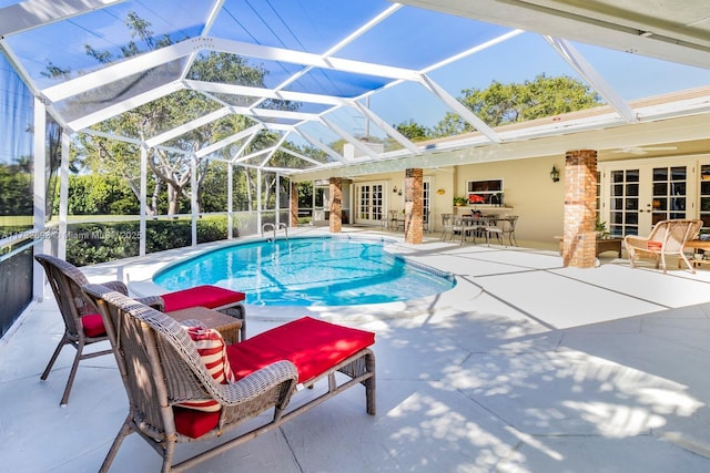7420 SW 145th Ter, Palmetto Bay, FL 33158 - view of swimming pool featuring a patio area, french doors, and glass enclosure