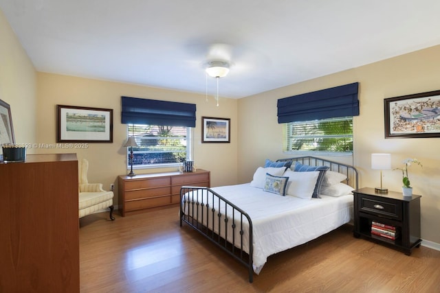7420 SW 145th Ter, Palmetto Bay, FL 33158 - bedroom with ceiling fan, wood-type flooring, and multiple windows