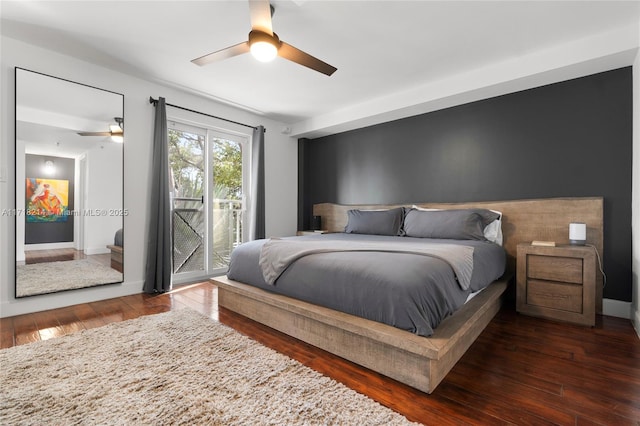 bedroom with dark hardwood / wood-style floors, ceiling fan, and access to exterior