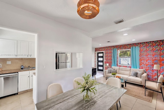 tiled dining space with sink