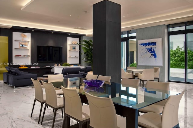 50 S Pointe Dr Unit 1704, Miami Beach, FL 33139 - dining space featuring light marble finish flooring, a tray ceiling, and recessed lighting