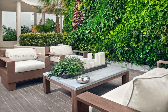 50 S Pointe Dr Unit 1704, Miami Beach, FL 33139 - wooden deck with an outdoor living space and a patio area