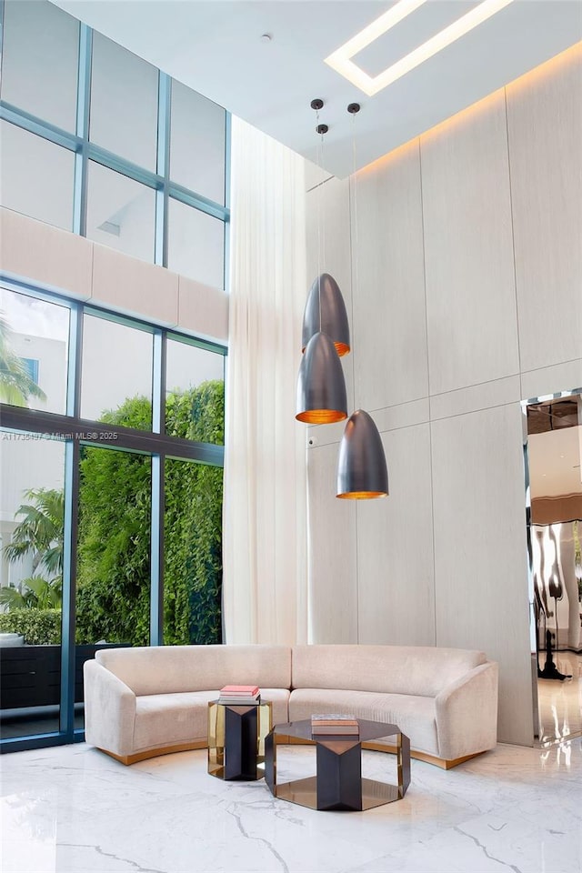 50 S Pointe Dr Unit 1704, Miami Beach, FL 33139 - lobby with a towering ceiling