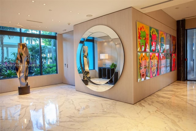 50 S Pointe Dr Unit 1704, Miami Beach, FL 33139 - corridor with marble tiled floors and wooden walls