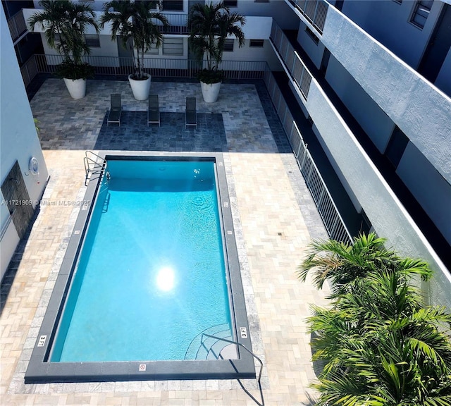 pool with a patio
