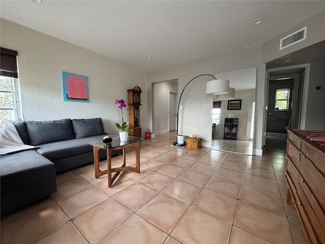 living room with light tile patterned floors