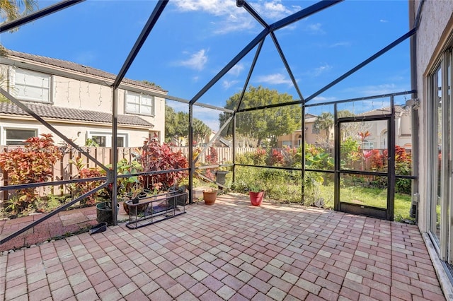 view of patio / terrace with glass enclosure