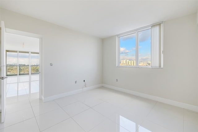 view of tiled spare room