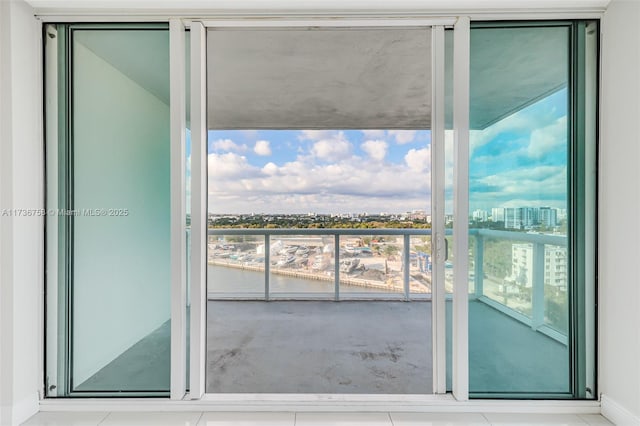 balcony featuring a water view