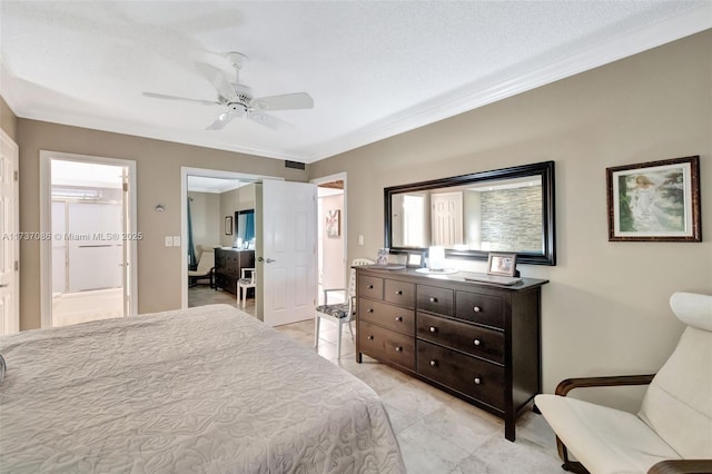 bedroom featuring crown molding, light tile patterned floors, ceiling fan, and ensuite bath