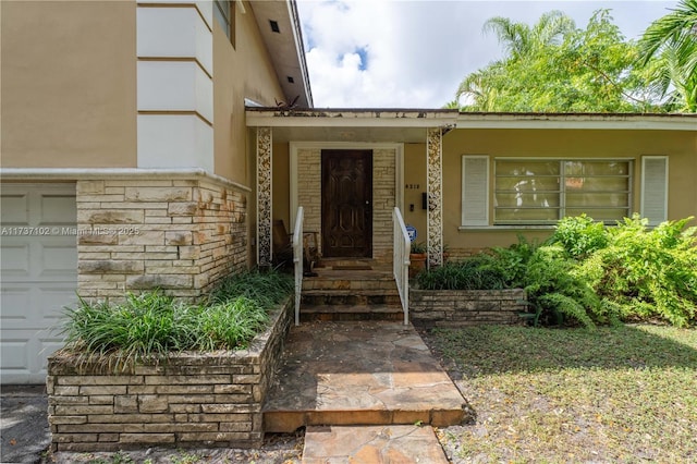 entrance to property with a garage