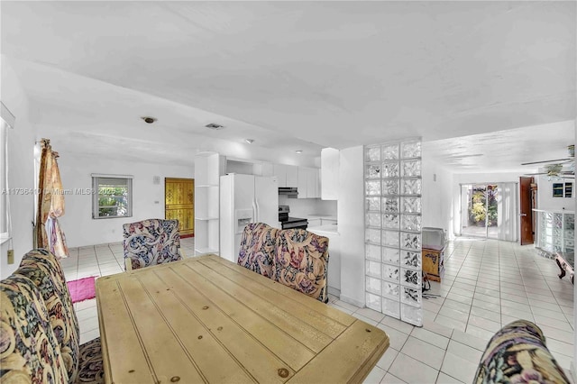 dining room with light tile patterned flooring