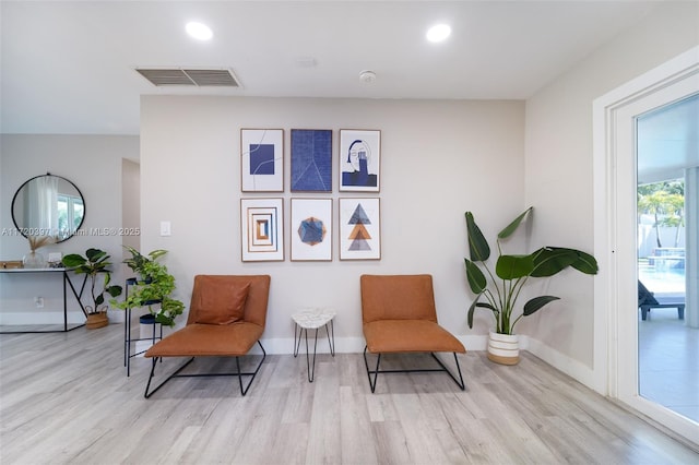 living area featuring light hardwood / wood-style flooring