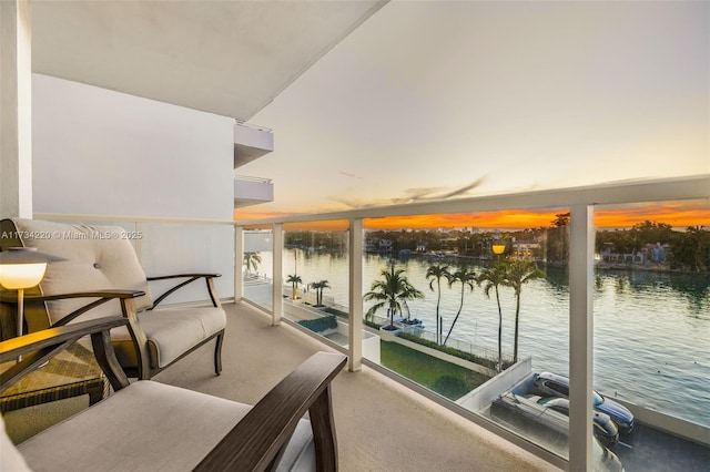 balcony at dusk with a water view