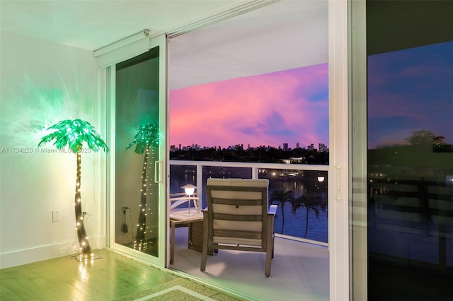 view of balcony at dusk